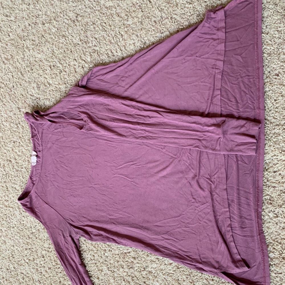 Long sleeve shirt with shoulder slits